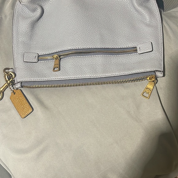 Coach light blue wristlet
